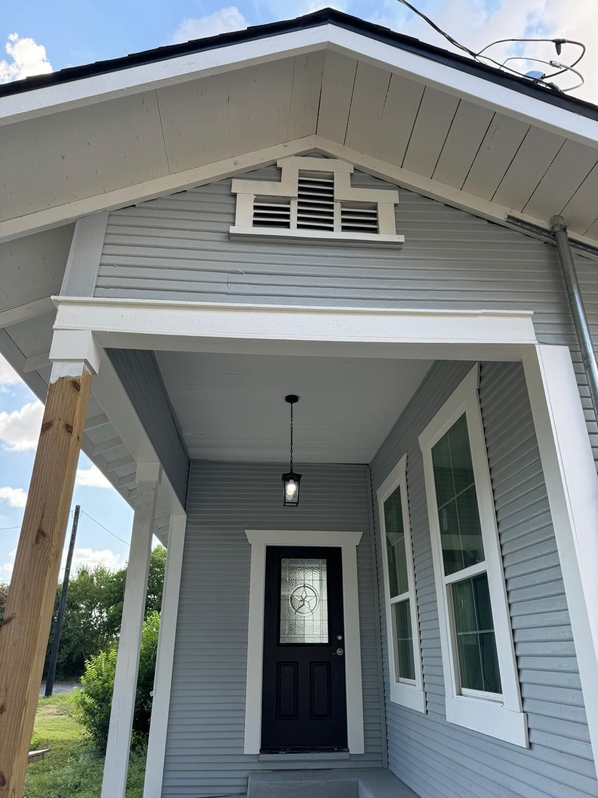 Exterior of a home being painted
