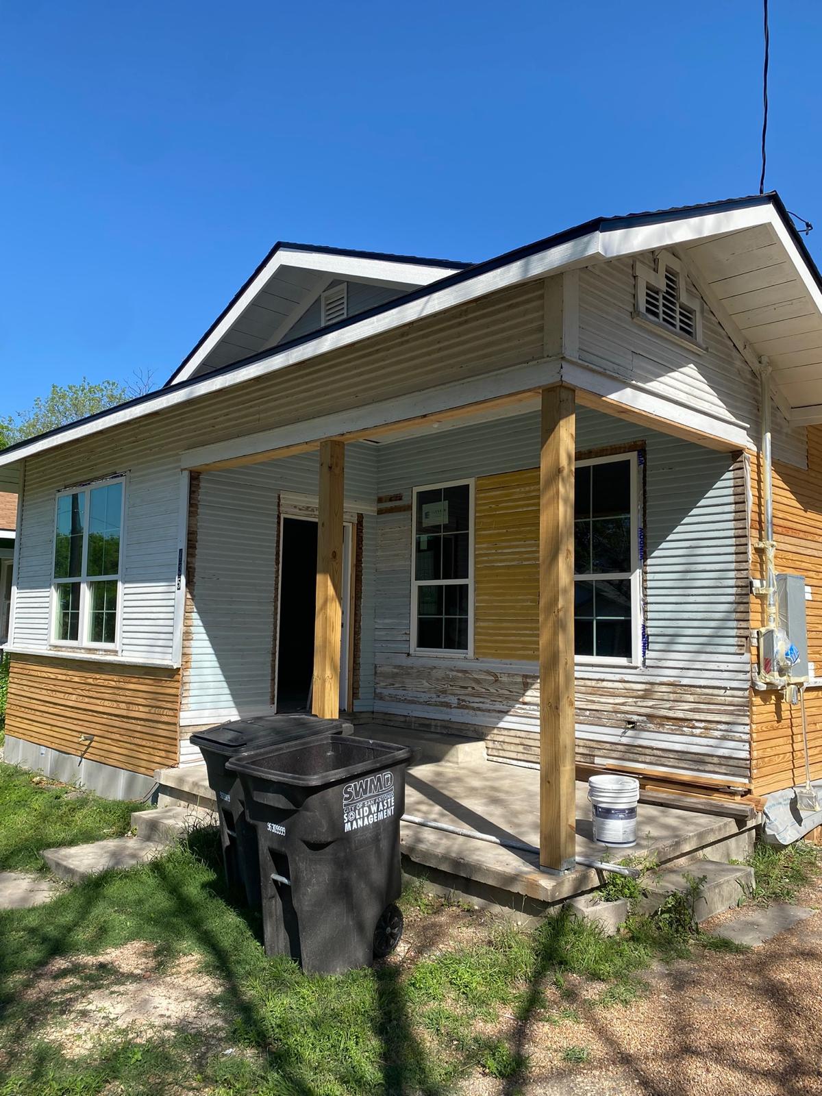 Exterior of a home being painted